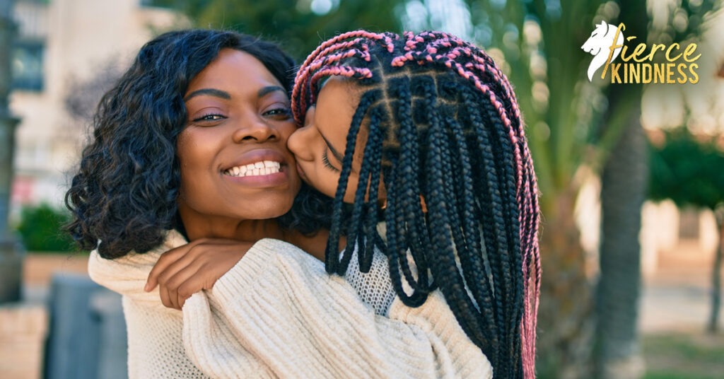 Mother's Day Ideas with Mother and Daughter hugging outside