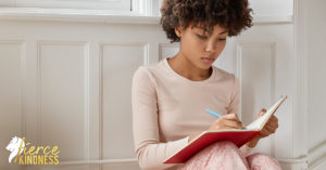 Person journalling through feelings using 3 As Process