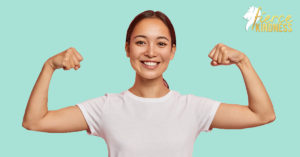 Woman feeling strong with fists pumped for Stockdale Paradox