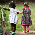 Two girls different backgrounds