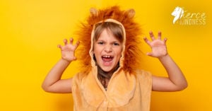 Girl pretending to be a lion