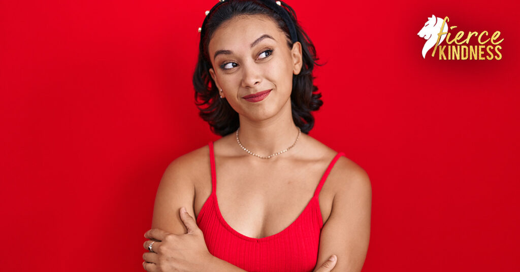 Woman on red background considering response to Eustress