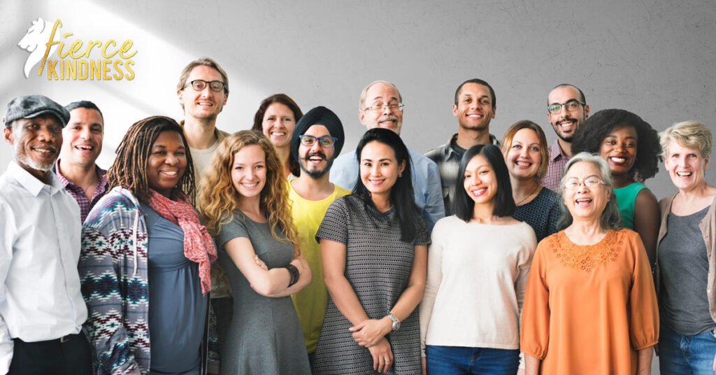Diverse group of people smiling in support