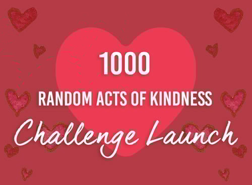 1000 RAKs Challenge Launch text over large heart with read background and hearts