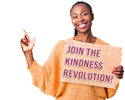 Kindness Community Hero Image - Woman Pointing with Sign saying Join the Kindness Revolution